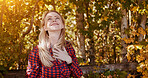 Outdoor, thinking and woman with a smile, summer break and wellness with happiness, relax and cheerful. Outside, forest and woods with girl, lens flare and model with environment, joyful and ideas