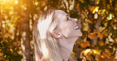 Buy stock photo Happy, nature and profile of woman in sunshine by the trees in outdoor park, field or garden. Smile, calm and peaceful female person from Canada by leaves and plants for fresh air and daydream