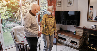 Buy stock photo Elderly, couple and help with walking stick for care, support or assistance on sofa in living room of home. Senior, man or woman with disability or cane in lounge of retirement with love and recovery