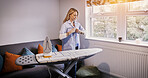 Iron, board and woman with shirt in morning, cleaning or dressing for work as a cleaner in apartment. Ironing, laundry and person in living room button uniform, blouse or clean clothes in home