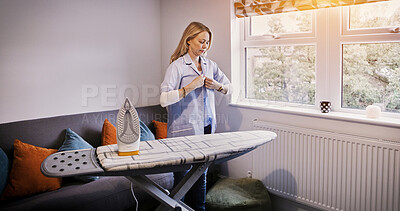Buy stock photo Iron, board and woman with shirt in morning, cleaning or dressing for work as a cleaner in apartment. Ironing, laundry and person in living room button uniform, blouse or clean clothes in home
