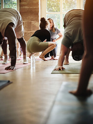 Buy stock photo Support, instructor teaching or women in yoga class for meditation or body flexibility in zen studio. Coach, help or calm people in pilates club for chakra energy, aura or wellness to relax together