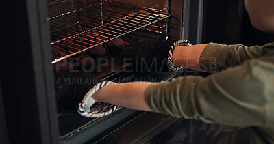 Buy stock photo Baking, muffins and hands with tray in oven, kitchen or morning in bakery with process of production. Cooking, dessert or person with cupcakes for a delicious snack, pastry or prepare food in home