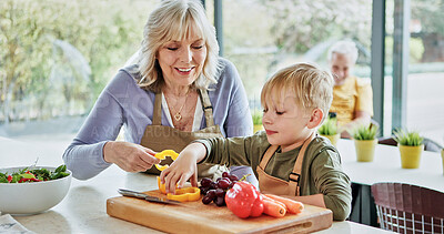 Buy stock photo Teaching, grandmother or child cooking for lunch, vegetables or nutrition with love in family home. Fruits, grandparents or happy kid with elderly grandma, smile or food for health, care or wellness