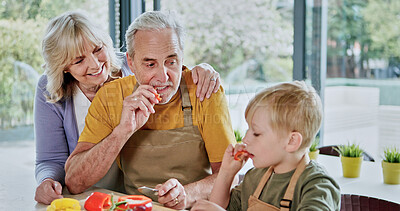 Buy stock photo Senior people, child or eating vegetables in kitchen with teaching, wellness or lesson on healthy food. Grandparents, grandchild or learn of nutrition on weekend, together or care in modern apartment