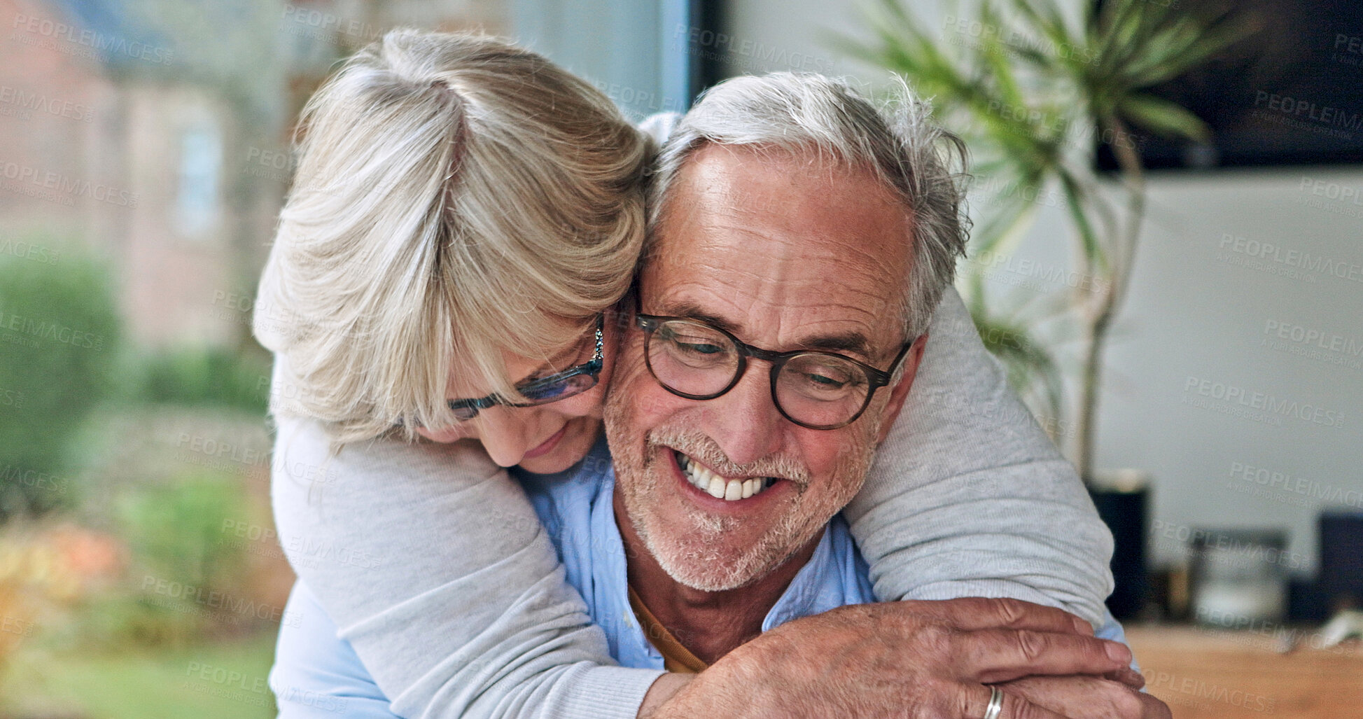 Buy stock photo Happy, embrace and senior couple at their home for love, bonding and romance together in morning. Smile, care and elderly woman hugging her husband from Australia at modern house on a weekend.
