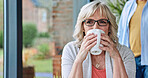 Coffee, thinking and senior woman at their home for bonding together on a weekend morning. Happy, marriage and elderly female person drinking a cappuccino or latte in dining room at modern house.