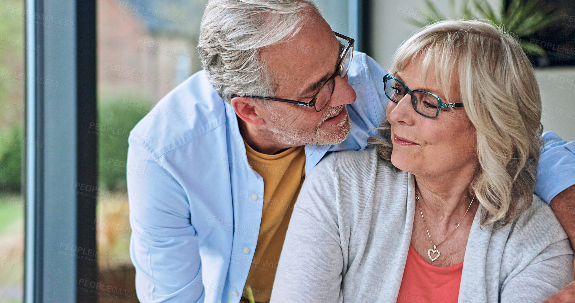 Buy stock photo Love, hugging and senior couple at their home for happiness, bonding and romance together in morning. Smile, care and elderly man embracing his wife from Australia at modern house on a weekend.