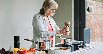 Buy stock photo Laptop, cooking and senior woman in the kitchen of modern home for healthy or diet supper. Food, technology and elderly female person preparing a meal for dinner or lunch with computer at house.