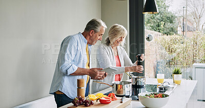Buy stock photo Elderly, couple and cooking in kitchen with tablet for meal prep, recipe idea and digital menu with smile. Senior, man and woman with technology at home for healthy food ingredients and diet planning