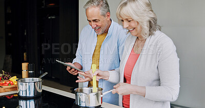 Buy stock photo Elderly, couple and cooking in kitchen with tablet for meal prep, recipe idea and digital menu with happy. Senior, man and woman with technology at home for healthy food ingredients and diet planning