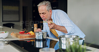 Buy stock photo Cooking, kitchen and old man taste food for lunch, supper and prepare healthy dinner in home. Retirement, wellness and mature person with natural ingredients, cutting vegetables and organic meal