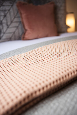 Buy stock photo Closeup, fabric and interior of bedroom blanket, pillows or duvet and comforter for accommodation. Empty hotel room in house, apartment or resort with cozy linen sheets for hospitality and home decor
