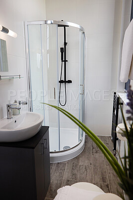 Buy stock photo Shower, bathroom and interior in home or luxury hotel accommodation for clean, hygiene or washing. Sink, apartment and design property or glass in London for empty room, real estate or architecture