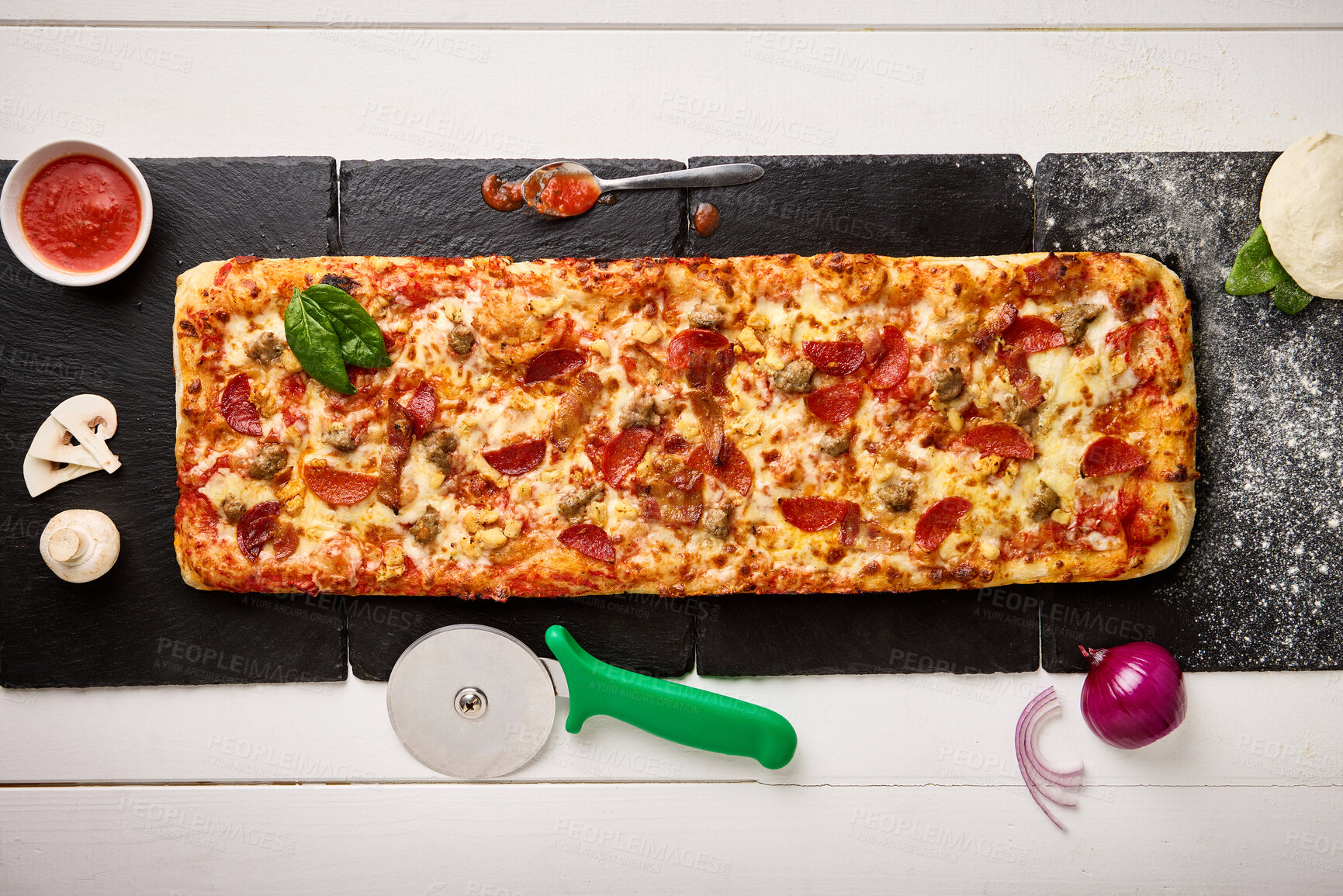 Buy stock photo Top view, fast food and dough of pizza with preparation for dinner, baking process and ingredients on kitchen table. Patisserie, napoli sauce and onion with mushroom in restaurant or cafe from above