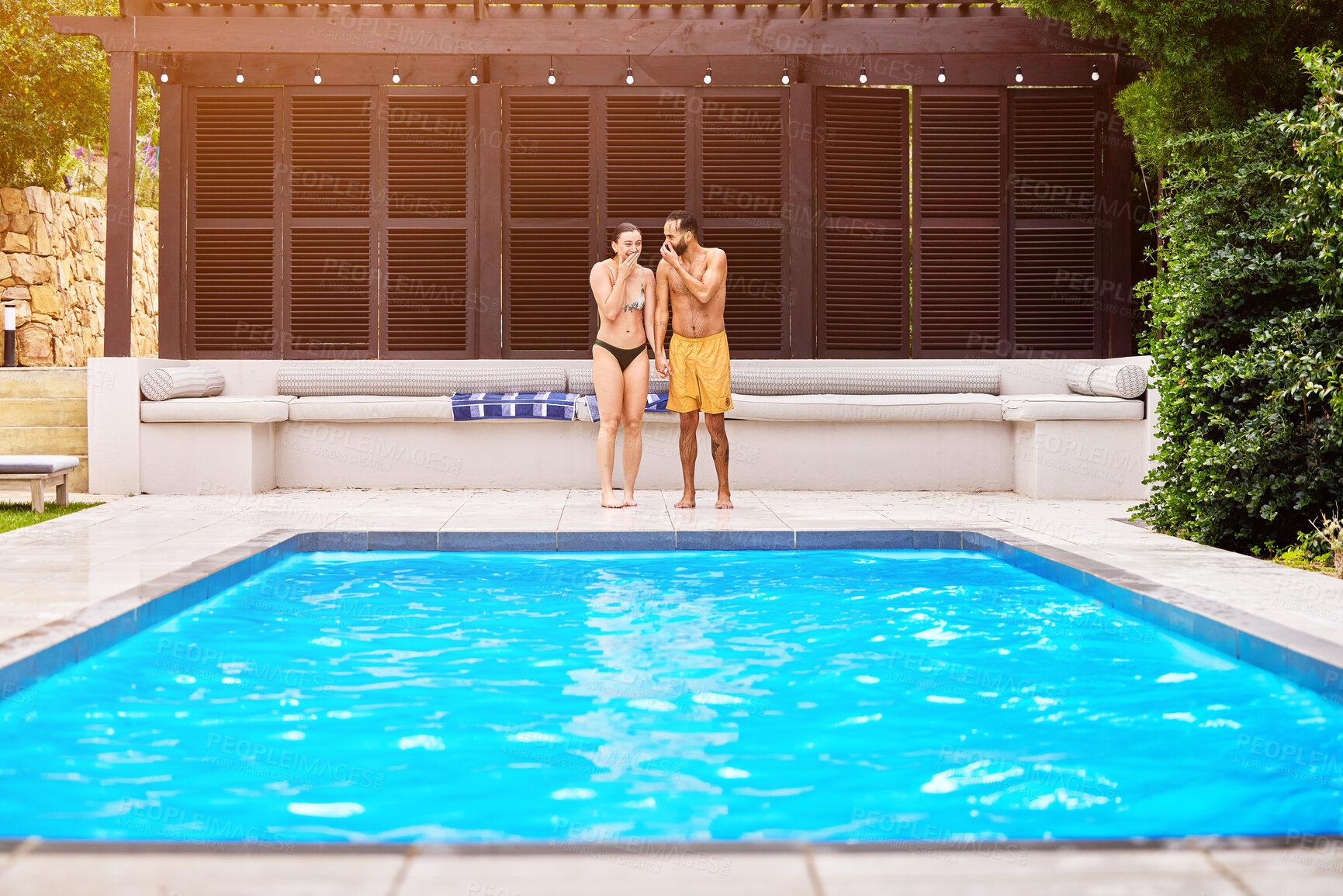 Buy stock photo Swimming pool, couple and holding hands outdoor for relax, travel and summer at luxury hotel as holiday. Water, people and sun for wellness, hospitality and vacation at resort in Bali with freedom