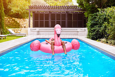 Buy stock photo Relax, man and swimming pool on float outdoor for inflatable flamingo, enjoy water and poolside nap on vacation. Person, floating and support with freedom, calm and fun in sunshine on summer break