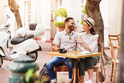 Buy stock photo Happy couple, hug and travel with love at cafe on date, sightseeing or outdoor bonding together. Young man, woman or tourist enjoying romantic getaway, reservation or holiday trip outside coffee shop