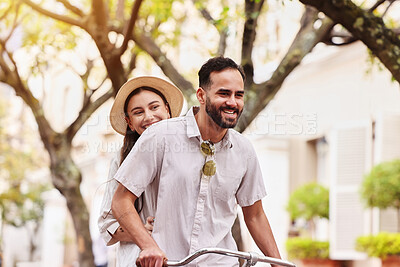 Buy stock photo Happy couple, bicycle and travel with date in city for fun bonding, weekend or outdoor holiday. Young man, woman or tourists enjoying cycling, leisure or activity together on bike in urban town