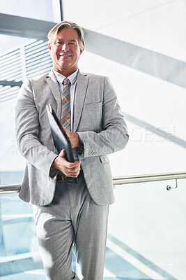 Buy stock photo Mature man, portrait and documents in workplace with confidence, pride and legal paperwork for court. Corporate lawyer, face and happy in office for success, justice and law firm with experience