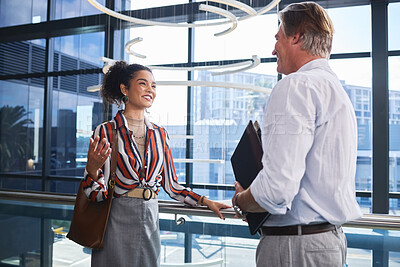 Buy stock photo Office, corporate and business people with discussion for onboarding, interaction and engagement with smile. Document, female intern and mature ceo for workplace orientation, talking and meeting