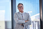 Crossed arms, smile and portrait of businessman in office with confidence for company finance revenue. Happy, pride and mature male investment banker from New York with financial career in workplace.