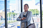 Arms crossed, phone and portrait with mature art director in office for design or project management. Confident, creative and management with happy employee man in professional workplace for startup