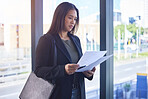 Business, woman and reading paperwork in office for budget planning, finance portfolio and payment loan. Serious, female person and document for review, report and legal asset management of lawyer