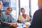 Meeting, documents and team of business people in office for company stock investment planning. Group, discussion and financial advisors with paperwork for b2b corporate finance contract with client.