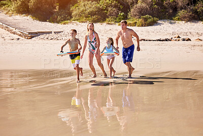 Buy stock photo Parents, happy and kids at beach with surfboard for summer vacation, holiday and weekend. Family, surfing and mom, dad and children excited for water sports for bonding, playing and fun together