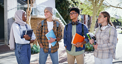 Buy stock photo Students, happy and books on campus for education, diversity and friendship in university. People, learners and smile outdoors for discussion, storytelling and talk on future career on class break