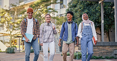 Buy stock photo Students, walking and outdoor on campus for conversation, talking and share knowledge on module. People, friends and outside for group project discussion, study lesson and together for trip to class