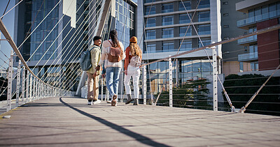 Buy stock photo City, students and friends walking on bridge in city together with smile, solidarity and conversation. Urban, university and happy group of friends chat on morning commute to college campus from back