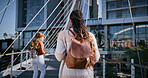 Student, education and walking with back of woman for learning, future and knowledge. University, academy and youth development with person at college campus for scholarship, school and studying