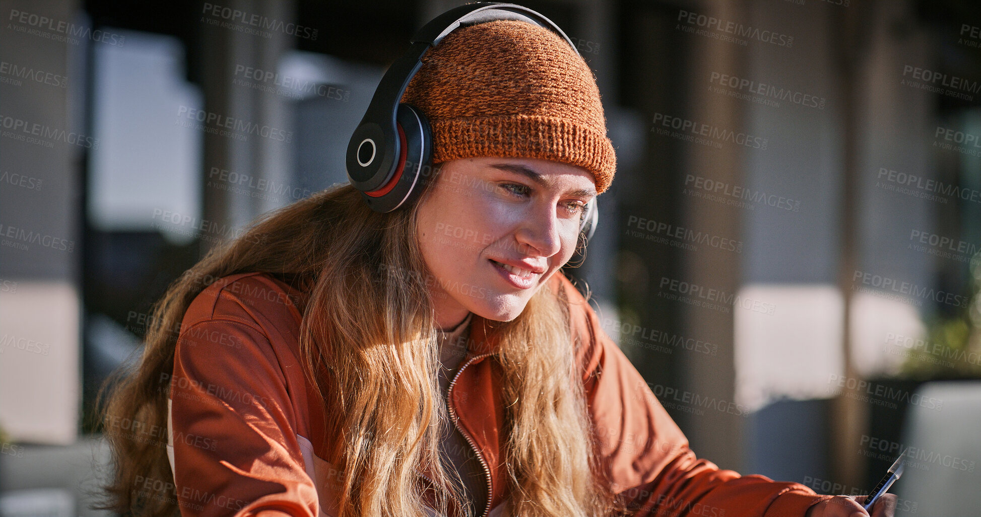 Buy stock photo Ideas, headphones and woman with laptop, smile and listening to audio, video editing and online. Outdoor, freelancer and content creation at cafe, sound and proud for post production and thinking