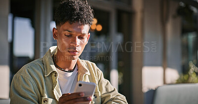 Buy stock photo Serious, man and student with phone outdoor for communication, scholarship feedback and opportunity. Male person and typing on mobile app for education schedule, reading offer and university results
