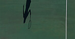 Shadow, tennis court and athlete with training for match, challenge or championship with sports. Fitness, practice and silhouette player on field for outdoor workout, game or exercise at competition.