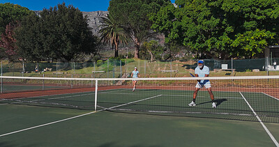 Buy stock photo Tennis, sport and mature people with racket, performance and playing of game for exercise, healthy and active. Outdoor, training and athlete with equipment for workout, match or confident for fitness