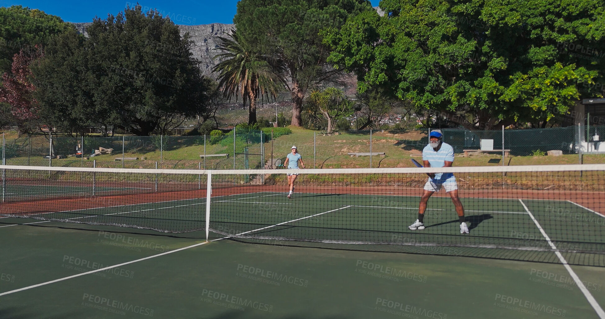 Buy stock photo Tennis, sport and mature people with racket, performance and playing of game for exercise, healthy and active. Outdoor, training and athlete with equipment for workout, match or confident for fitness