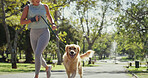 Active, dog walking and running with woman in park for cardio exercise, fitness or health hobby. Leash training, obedience and pet performance with animal owner outdoor in nature for summer workout