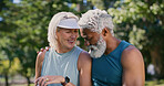 Break, exercise and hug with mature couple in park together for fitness, running or training. Funny, laughing or rest with interracial man and woman outdoor for cardio, health or wellness activity
