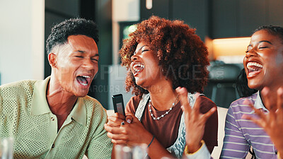 Buy stock photo Karaoke, microphone and friends singing in home for celebration, laughing and bonding at social gathering. Singer, group and people in living room for song with music, entertainment and fun at party