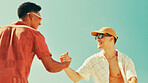 Smile, men and friends for handshake on beach of greeting, meeting and success of vacation. People, sunglasses and shaking hands for reunion agreement, introductions and thank you of tropical holiday