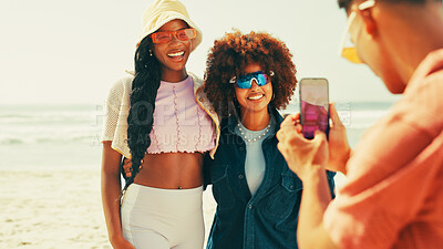 Buy stock photo Picture, happy and friends on beach for holiday, summer vacation and adventure together in nature. Relax, phone and girls hug for photograph for social media, online post and memory on weekend at sea