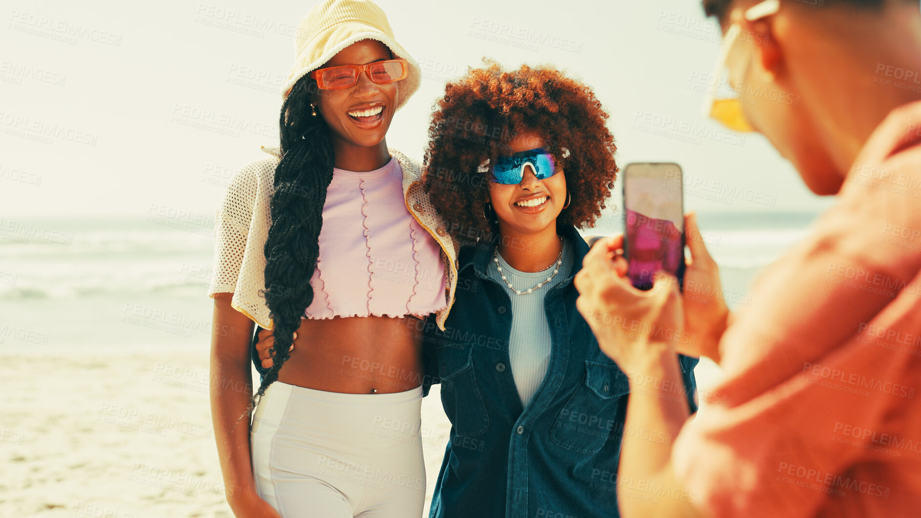 Buy stock photo Picture, happy and friends on beach for holiday, summer vacation and adventure together in nature. Relax, phone and girls hug for photograph for social media, online post and memory on weekend at sea