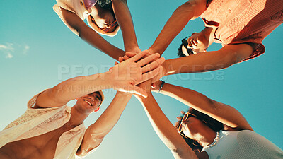Buy stock photo Below, hands together and friends with blue sky, vacation and travel with summer holiday. Low angle, people and men with women, tropical island and support with fun, weekend break or reunion party