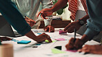 People, designers and hands with documents for planning, schedule or meeting together at office. Closeup, group or team working with paperwork or sticky note for sharing ideas on creative strategy