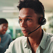 Call center, explain and problem solving with man in office for ...