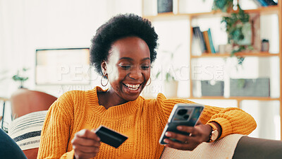 Buy stock photo Home, credit card and black woman on sofa, smartphone and online payment with smile. Apartment, mobile user and African person on couch, cellphone and banking for transactions, ecommerce and savings