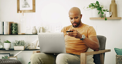 Buy stock photo Home, black man and laptop with credit card for payment, password information and online shopping. Sofa, male person and digital with debit for ecommerce, transaction and subscription for application